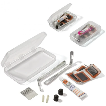 Tire repair kit in plastic box